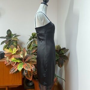 Black mini slip dress with spaghetti straps for cocktail